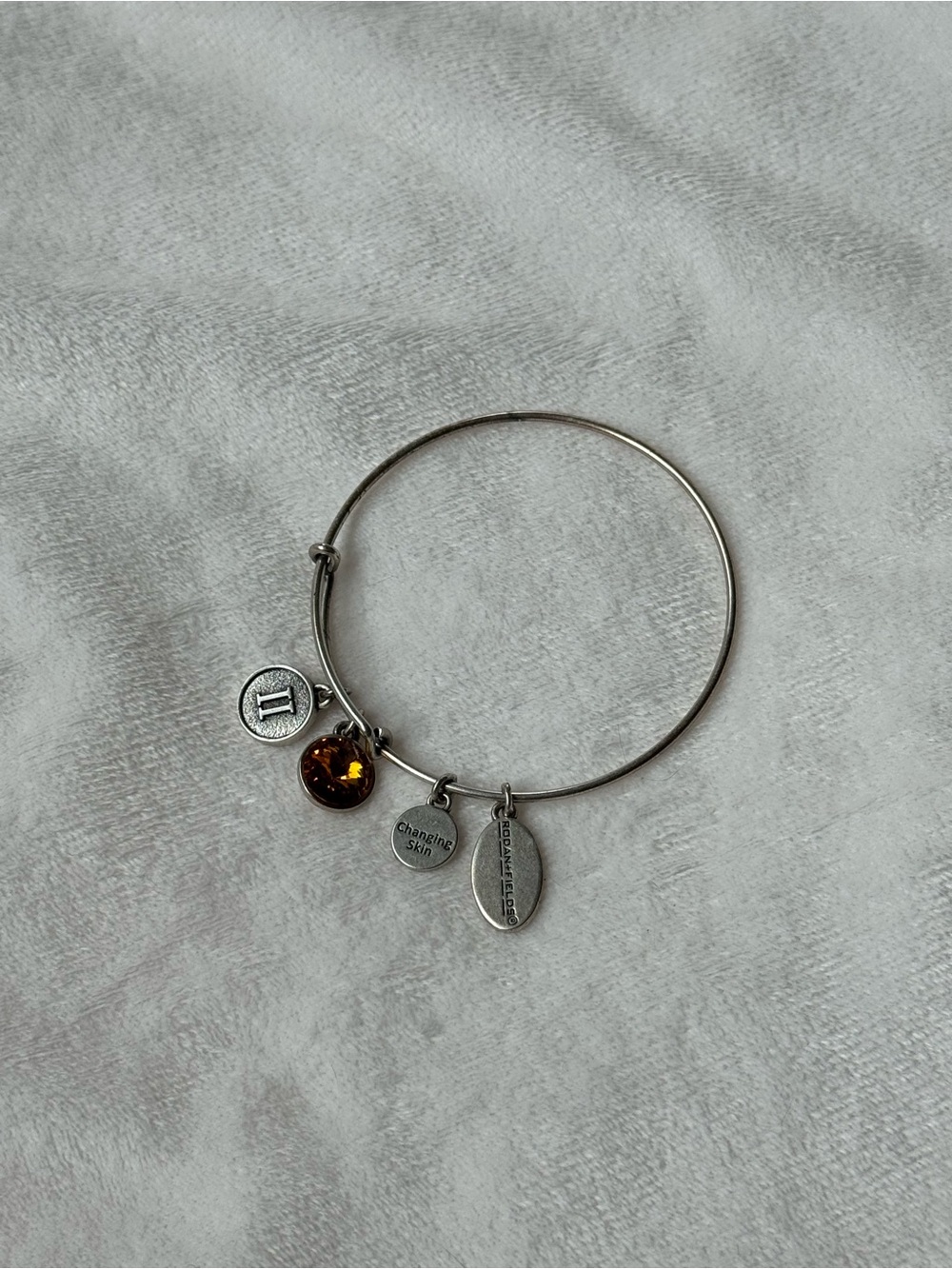 Rodan + Fields Silver Bangle Bracelet with Amber Charm